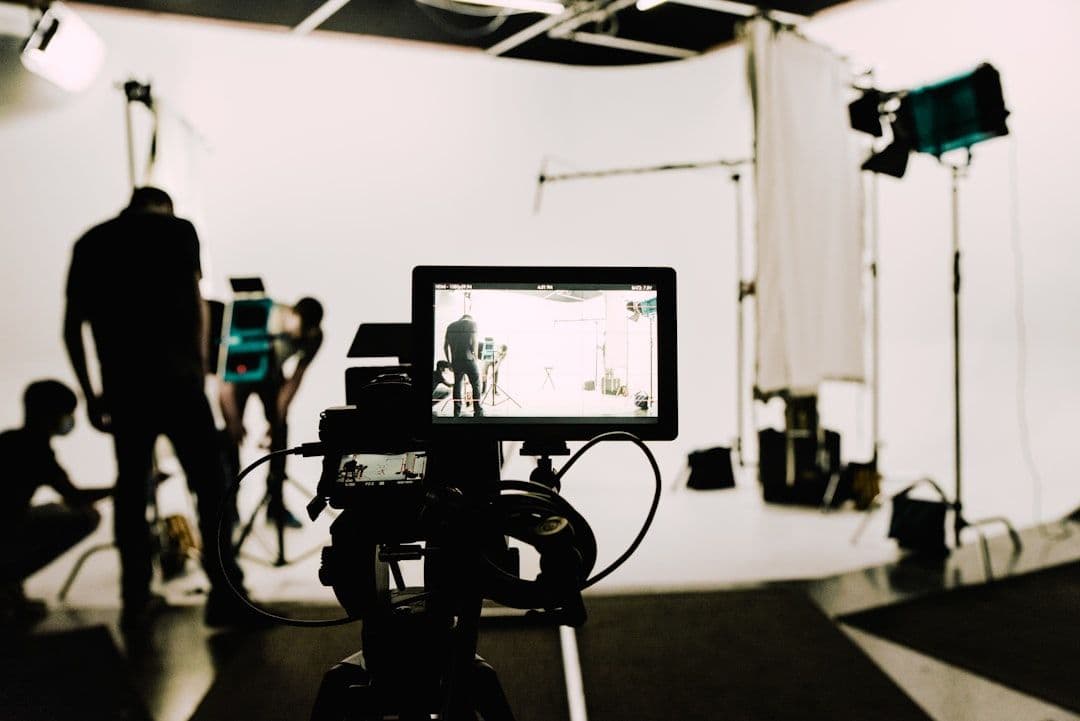 Kru videografi event mengatur audio capture dari mixer venue